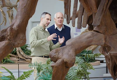 Ross explains to Tackett what dinosaurs can tell us about the Earth's origins.